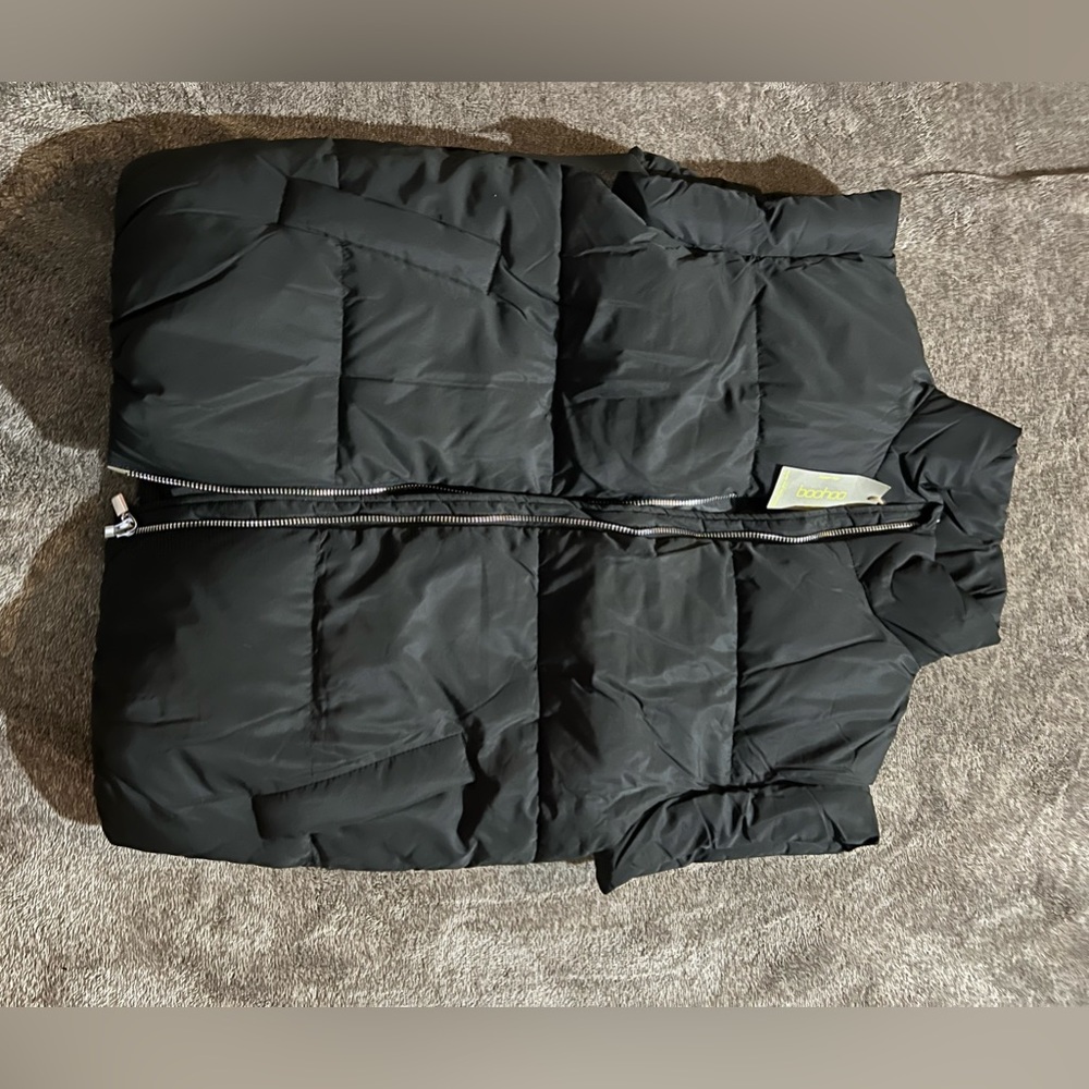 Black puffer vest